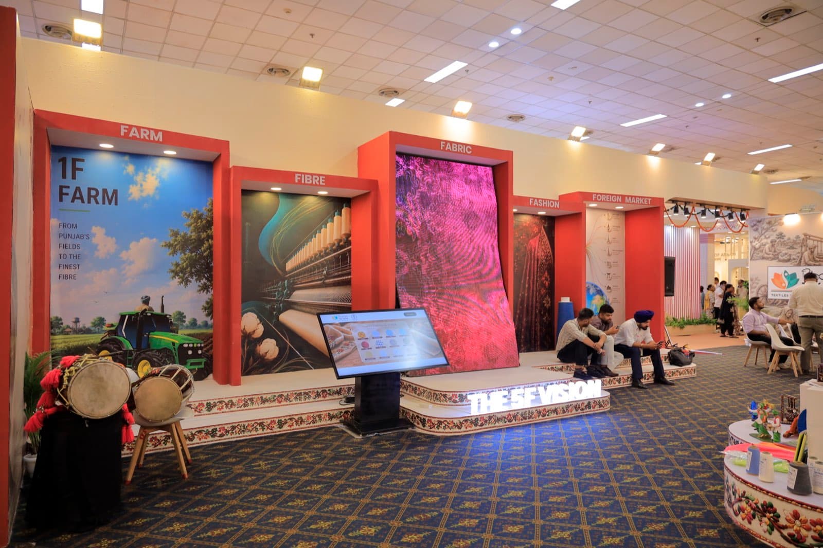 The 5F Vision pavilion at BharatTex with LED fabric display and interactive touchscreen